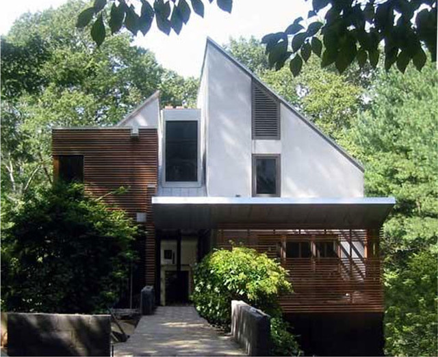 Фотография экстерьера дома со срезанной крышей